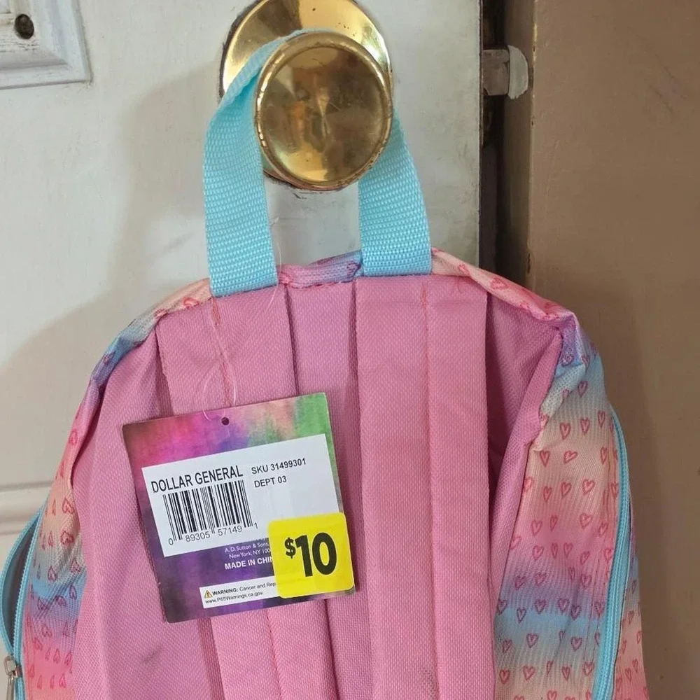 Pink and blue heart patterned backpack with glitter heart
